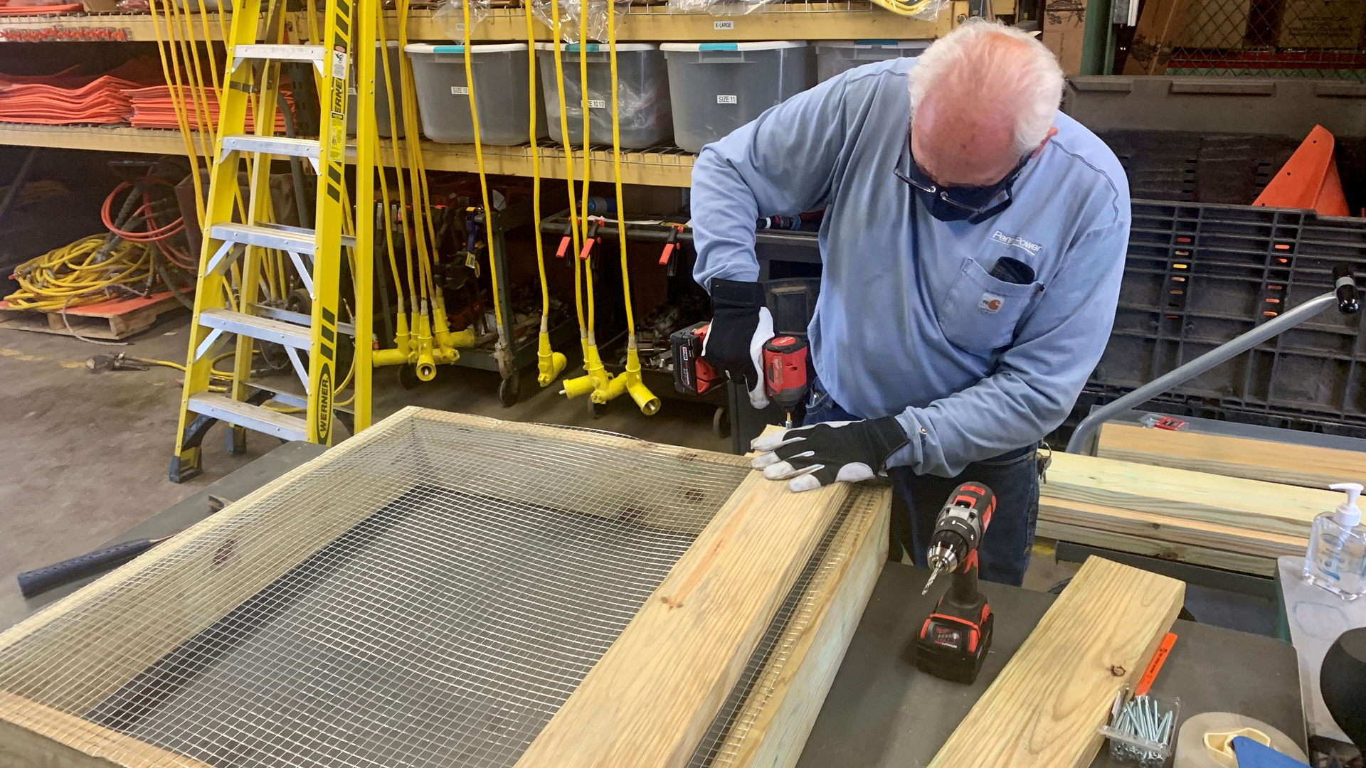 FirstEnergy utility personnel building a nesting platform.