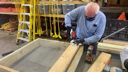 FirstEnergy utility personnel building a nesting platform. FirstEnergy utility personnel building a nesting platform.