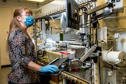 Often the first step in research to develop next-generation battery technologies is identifying promising new materials and chemistries from countless potential combinations, which can be like searching for a needle in a haystack. Above, a PNNL researcher uses High Throughput Experimentation (HTE) equipment to efficiently analyze thousands of potential chemistry combinations for new battery designs.