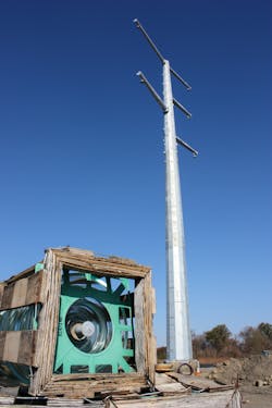 Other than the river crossing structures, single steel monopoles were used throughout the 375-mile transmission line program. Standard pole height on the project ranges from 110 ft-120 ft with a delta conductor configuration and dual shield wire arms. Glass insulators are preferred for their longevity. Other than the river crossing structures, single steel monopoles were used throughout the 375-mile transmission line program. Standard pole height on the project ranges from 110 ft-120 ft with a delta conductor configuration and dual shield wire arms. Glass insulators are preferred for their longevity.