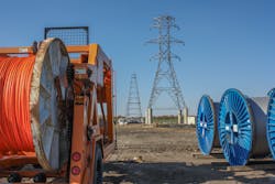 The river crossing towers are designed to withstand an F2 tornado — 135-mile-per-hour winds. Each tower weighs three quarters of a million pounds and there are a total of 64,000 bolts on the four river crossing towers. Industry standard 945 Cardinal conductors (on blue spools) meet Ameren’s 345 kV amperage requirements and are used throughout the entire program. The river crossing towers are designed to withstand an F2 tornado — 135-mile-per-hour winds. Each tower weighs three quarters of a million pounds and there are a total of 64,000 bolts on the four river crossing towers. Industry standard 945 Cardinal conductors (on blue spools) meet Ameren’s 345 kV amperage requirements and are used throughout the entire program.