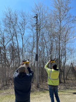 Exacter VP of Operations Bill McConaha and Project Manager Terry Hughes spent several days in the field with LREC lineworker. They showed them best practices for using the ultrasonic dish that pinpoints deteriorating equipment found by driving assessments. Exacter VP of Operations Bill McConaha and Project Manager Terry Hughes spent several days in the field with LREC lineworker. They showed them best practices for using the ultrasonic dish that pinpoints deteriorating equipment found by driving assessments.