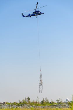 Using a “flying crane” helicopter near Moss Bluff, Louisiana, workers were able to clear hurricane debris quickly, making way for the repair and replacement of six transmission structures on the line. Using a “flying crane” helicopter near Moss Bluff, Louisiana, workers were able to clear hurricane debris quickly, making way for the repair and replacement of six transmission structures on the line.