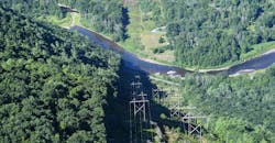 FirstEnergy&rsquo;s circuitry is visible on the left of this image of a 230 kV transmission line in northern Pennsylvania.