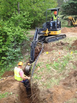 Crews dig trench to install underground cable as part of SMRP. To date, WPS has installed 1629 miles of underground circuits. Crews dig trench to install underground cable as part of SMRP. To date, WPS has installed 1629 miles of underground circuits.
