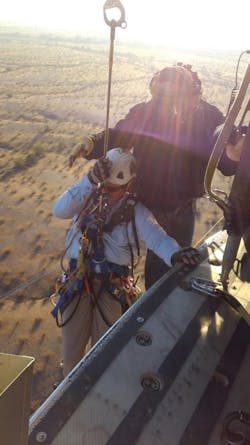 Davis, who works out of the East Valley Service Center, is part of a crew who performs power inspections and maintenance on hard-to-access transmission lines across the state of Arizona. Davis, who works out of the East Valley Service Center, is part of a crew who performs power inspections and maintenance on hard-to-access transmission lines across the state of Arizona.