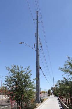 This existing pole has a 12 kV underground rise adding to the congestion. This existing pole has a 12 kV underground rise adding to the congestion.