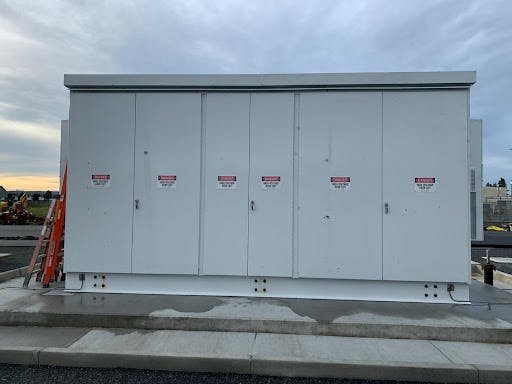 Exterior view of an ESS cabinet with doors closed &ndash; Snohomish Public Utility District microgrid in Arlington, Washington.