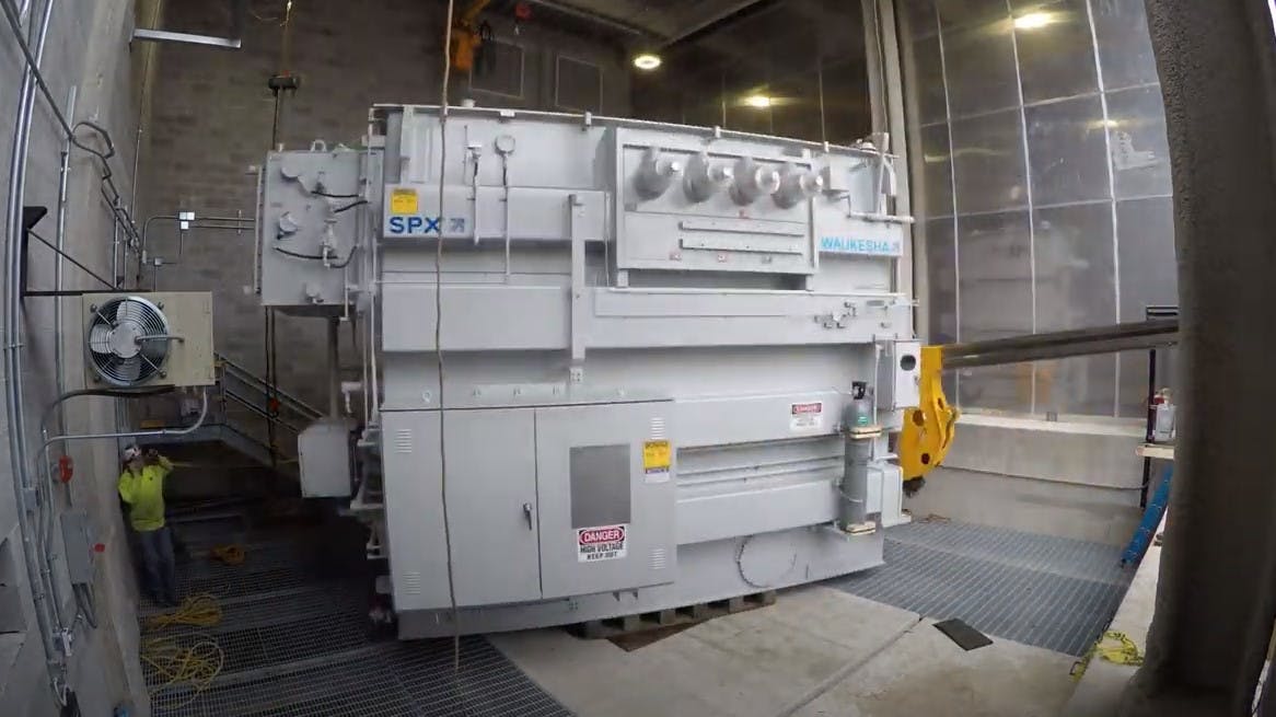 Spinning underway: After transformers were slid into bay, gantries &mdash; located in bay &mdash; were used to lift and slowly lower transformer as rails and cribbing were removed. Finally, 160,000-lb transformers were spun into final orientation using a milling plate.