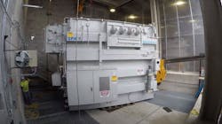 Spinning underway: After transformers were slid into bay, gantries — located in bay — were used to lift and slowly lower transformer as rails and cribbing were removed. Finally, 160,000-lb transformers were spun into final orientation using a milling plate. Spinning underway: After transformers were slid into bay, gantries — located in bay — were used to lift and slowly lower transformer as rails and cribbing were removed. Finally, 160,000-lb transformers were spun into final orientation using a milling plate.