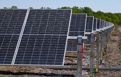 More than 350,000 photovoltaic panels cover 800 acres in White County, Ark., for Searcy Solar, which will have 30 MWh of battery storage once the project goes online. More than 350,000 photovoltaic panels cover 800 acres in White County, Ark., for Searcy Solar, which will have 30 MWh of battery storage once the project goes online.