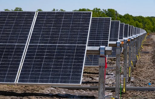 More than 350,000 photovoltaic panels cover 800 acres in White County, Ark., for Searcy Solar, which will have 30 MWh of battery storage once the project goes online.