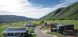 Basalt Vista Affordable Housing Community, in the rural town of Basalt, Colorado—population 4,170, NREL is testing one of its most novel grid operation solutions. Members of local electric cooperative Holy Cross Energy are sharing electricity between solar panels, batteries, heaters, and electric vehicles. Basalt Vista Affordable Housing Community, in the rural town of Basalt, Colorado—population 4,170, NREL is testing one of its most novel grid operation solutions. Members of local electric cooperative Holy Cross Energy are sharing electricity between solar panels, batteries, heaters, and electric vehicles.