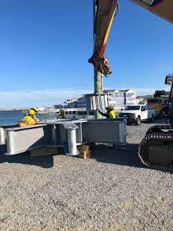Grillage assembly being bolted together. This assembly also houses the anchor bolt cluster which will receive the tower base for final installation. Grillage assembly being bolted together. This assembly also houses the anchor bolt cluster which will receive the tower base for final installation.