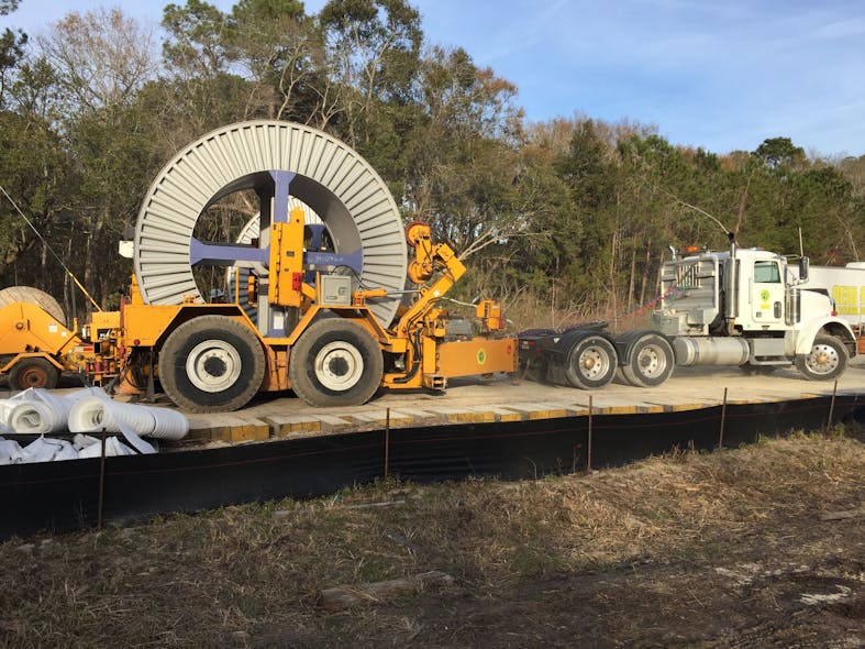 A specialized reel trailer. CEPCI chose extruded-dielectric, XLPE-insulated cables for this project.