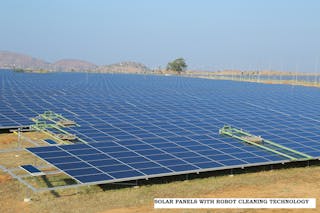 Pavagada solar park showing use of solar panel robot cleaning technology.