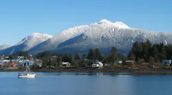 A small fishing boat heads for the cannery in Wrangell, Alaska. Wrangell Island is part of the Alexander Archipelago that hugs the North American continent near the border between Alaska and the U.S. and British Columbia, Canada.
