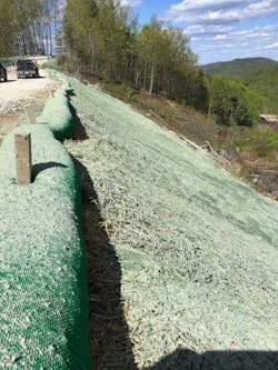 Environmental managers captured this picture with the mapping app. The image depicts a roll that prevents erosion of grass seed and sediment along a mountain road traversing the transmission line project. Environmental managers captured this picture with the mapping app. The image depicts a roll that prevents erosion of grass seed and sediment along a mountain road traversing the transmission line project.