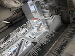 A power plant in Entergy Texas service territory is shown with icicles due to the severely cold temperatures in the region.