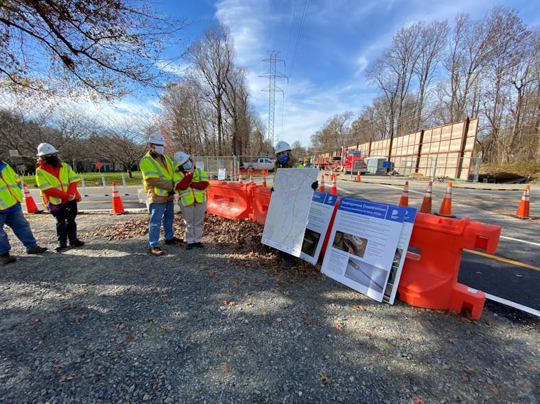 Dominion Energy project team explains the horizontal directional drilling process to community members before providing a tour of the drill site.