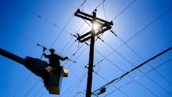 A Santee Cooper line worker performs maintenance on a distribution line. The utility delivers power to more than 200,000 residential and commercial customers. A Santee Cooper line worker performs maintenance on a distribution line. The utility delivers power to more than 200,000 residential and commercial customers.
