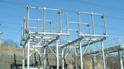 Figure 1: The center pivot, gang operated, three phase, air break switches on a 345 KV Disconnect Switch. If any of these switches are accidentally opened under load, the resulting arc will evolve into a three phase fault that will challenge continued operation of the electric power grid.