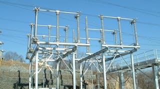 Figure 1: The center pivot, gang operated, three phase, air break switches on a 345 KV Disconnect Switch. If any of these switches are accidentally opened under load, the resulting arc will evolve into a three phase fault that will challenge continued operation of the electric power grid.