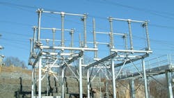 Figure 1: The center pivot, gang operated, three phase, air break switches on a 345 KV Disconnect Switch. If any of these switches are accidentally opened under load, the resulting arc will evolve into a three phase fault that will challenge continued operation of the electric power grid. Figure 1: The center pivot, gang operated, three phase, air break switches on a 345 KV Disconnect Switch. If any of these switches are accidentally opened under load, the resulting arc will evolve into a three phase fault that will challenge continued operation of the electric power grid.