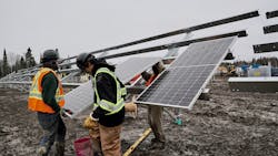 Assembling photovoltaic solar panels. Assembling photovoltaic solar panels.