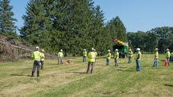 The wires under tension training program brings employees to Kent, Ohio, to learn how to safely remove trees from power lines.