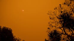 A bushfire clouds the sky with smoky haze in New South Wales, Australia.