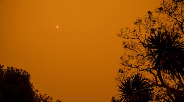 A bushfire clouds the sky with smoky haze in New South Wales, Australia.
