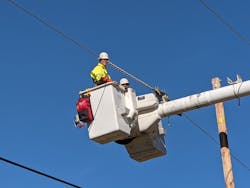 Workers in a bucket truck install vibration dampeners. PLP used span and design tension data to produce general placement recommendations for standard SCE construction, so field crews would have clear guidelines when installing the dampers. Workers in a bucket truck install vibration dampeners. PLP used span and design tension data to produce general placement recommendations for standard SCE construction, so field crews would have clear guidelines when installing the dampers.