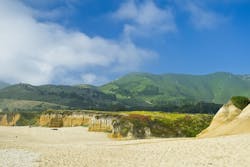 Half Moon Bay, California seen in an aerial view. A project EN Engineering participated in included hardening in place 1.2 miles (1.9 km) of tap lines and undergrounding an additional 800 ft (244 m) of primary line. Half Moon Bay, California seen in an aerial view. A project EN Engineering participated in included hardening in place 1.2 miles (1.9 km) of tap lines and undergrounding an additional 800 ft (244 m) of primary line.