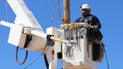 SRP Lineman Matt Hicks works on the Navajo Nation. SRP Lineman Matt Hicks works on the Navajo Nation.