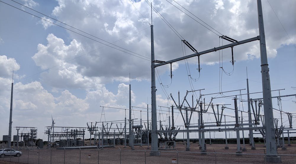 The Western Spirit Switchyard is a major 345 kV facility serving as the point of interconnection for the four windfarms. This is the transmission line terminations at the switching station showing some of the switching devices and incomplete buswork.