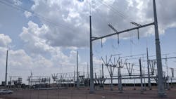 The Western Spirit Switchyard is a major 345 kV facility serving as the point of interconnection for the four windfarms. This is the transmission line terminations at the switching station showing some of the switching devices and incomplete buswork. The Western Spirit Switchyard is a major 345 kV facility serving as the point of interconnection for the four windfarms. This is the transmission line terminations at the switching station showing some of the switching devices and incomplete buswork.