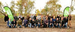 In the fall of 2021, volunteers from Alliant Energy and Linn County Conservation prepare to plant trees in Marion, Iowa as one of the first tree planting events for Alliant Energy&rsquo;s One Million Trees initiative.