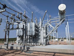 This 90 MVAr, oil-cooled shunt reactor is one of several units associated with voltage control during some high-generation levels of Western Spirit wind turbine generation. A complete oil moat can contain any oil (dielectric fluid) if the reactor tank should rupture, such as during a system fault or apparatus malfunction. This 90 MVAr, oil-cooled shunt reactor is one of several units associated with voltage control during some high-generation levels of Western Spirit wind turbine generation. A complete oil moat can contain any oil (dielectric fluid) if the reactor tank should rupture, such as during a system fault or apparatus malfunction.