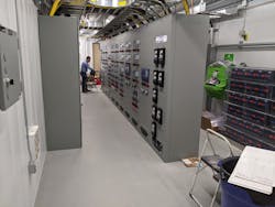 Control and protective relays and other control equipment can be seen to the left. On the right is a partial view of the significant 125 VDC station battery, power plant. It supplies the continuous DC power needed by the controls during some transmission disturbances. This is part of a redundant plant for reliability. Control and protective relays and other control equipment can be seen to the left. On the right is a partial view of the significant 125 VDC station battery, power plant. It supplies the continuous DC power needed by the controls during some transmission disturbances. This is part of a redundant plant for reliability.