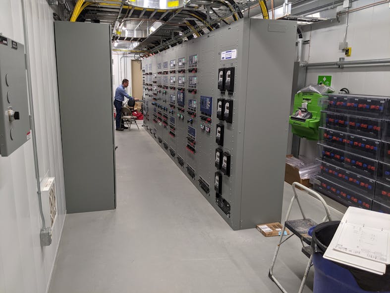 Control and protective relays and other control equipment can be seen to the left. On the right is a partial view of the significant 125 VDC station battery, power plant. It supplies the continuous DC power needed by the controls during some transmission disturbances. This is part of a redundant plant for reliability.