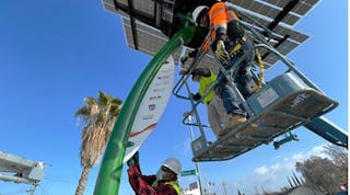Students (in bucket) from SMUD Energy Careers Pathways program, for adults ages 18 and up, receive hands-on technical skills education needed to work in the solar energy field.