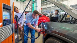 Representatives from Shell Global Solutions work with automaker Rivian to gather data on establishing a secure and encrypted connection between a charging station and an electric vehicle. Representatives from Shell Global Solutions work with automaker Rivian to gather data on establishing a secure and encrypted connection between a charging station and an electric vehicle.