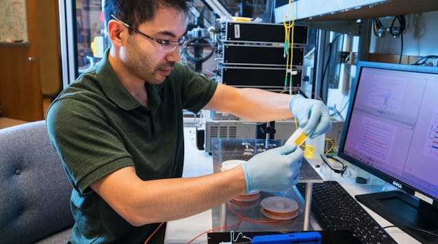 PARC research scientists Kyle Arakaki peforms some initial testing of fiber optic sensors.