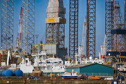 Closeup Esbjerg harbor with offshore construction equipment and platform legs high up and sky blue a sunny day. The Port of Esbjerg in Denmark is a highly successful marshaling port. 7000/Getty Images Closeup Esbjerg harbor with offshore construction equipment and platform legs high up and sky blue a sunny day. The Port of Esbjerg in Denmark is a highly successful marshaling port. 7000/Getty Images