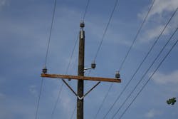 The as-built structure with the center phase 8 in. above the crossarm. The as-built structure with the center phase 8 in. above the crossarm.