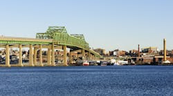 The Braga Bridge crosses the Taunton River near Fall River, Massachusetts. The city was famous in the 19th century as a hub of the U.S. textile industry. The Braga Bridge crosses the Taunton River near Fall River, Massachusetts. The city was famous in the 19th century as a hub of the U.S. textile industry.