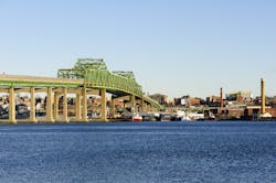 The Braga Bridge crosses the Taunton River near Fall River, Massachusetts. The city was famous in the 19th century as a hub of the U.S. textile industry. The Braga Bridge crosses the Taunton River near Fall River, Massachusetts. The city was famous in the 19th century as a hub of the U.S. textile industry.