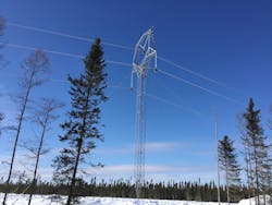 Guyed delta tower ready for conductor clip-in. Guyed delta tower ready for conductor clip-in.