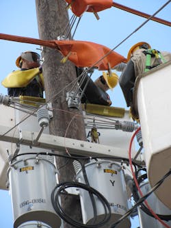 Hawaiian Electric crews work on a pole-mounted transformer. The utility has seen lead times jump from 16 weeks to 142 weeks for single-phase pad-mounted transformers. Hawaiian Electric crews work on a pole-mounted transformer. The utility has seen lead times jump from 16 weeks to 142 weeks for single-phase pad-mounted transformers.